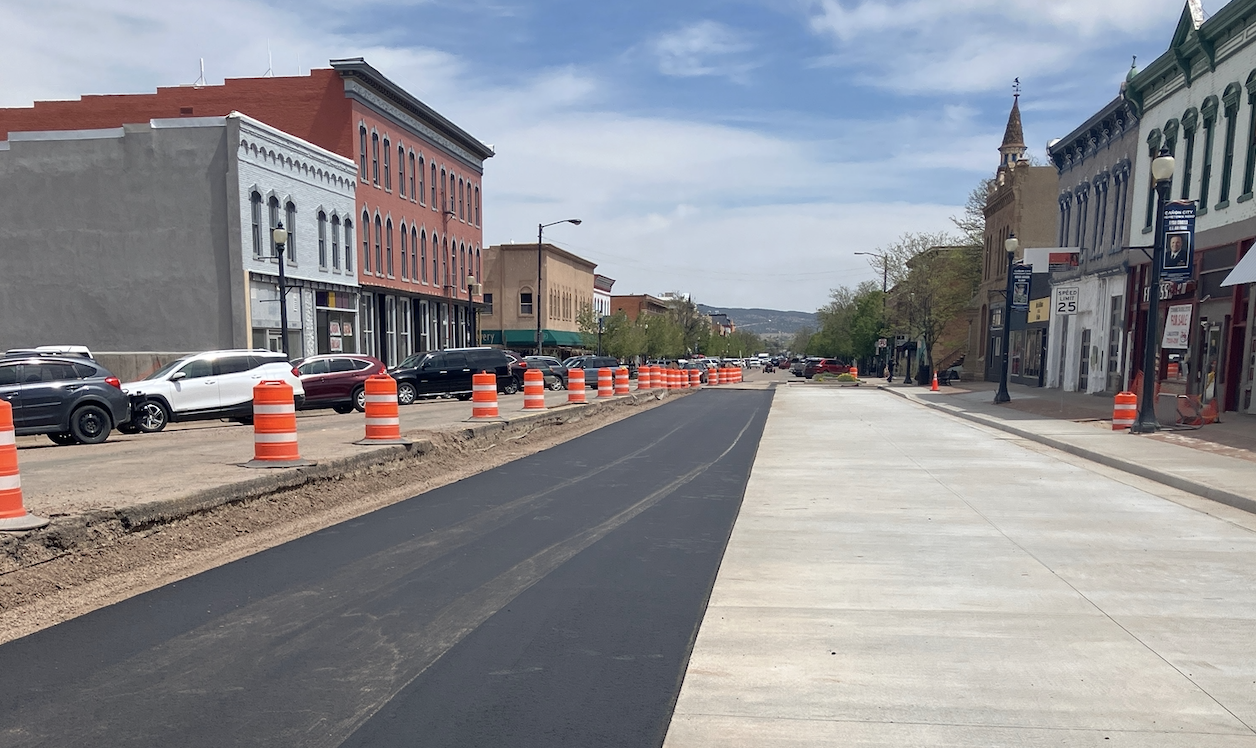 Photo of new road pavement on half of Main Street.