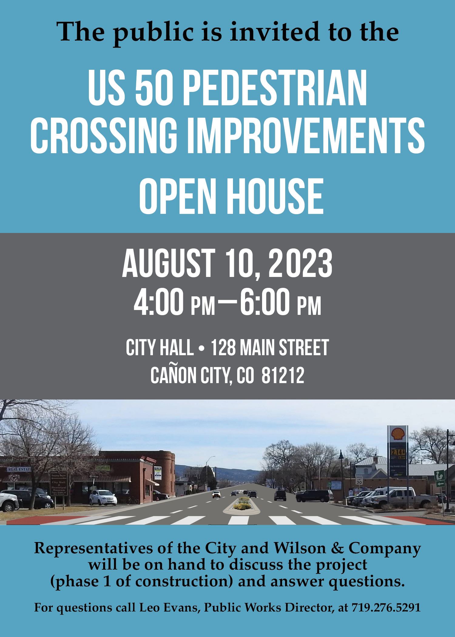 Photo of a highway with a median between the roadway with planted trees and crosswalk at each block