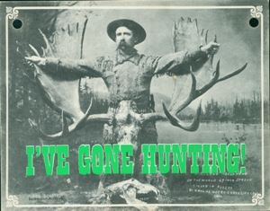 Black and white image of Dall DeWeese with a moose antlers. Circa 1897.